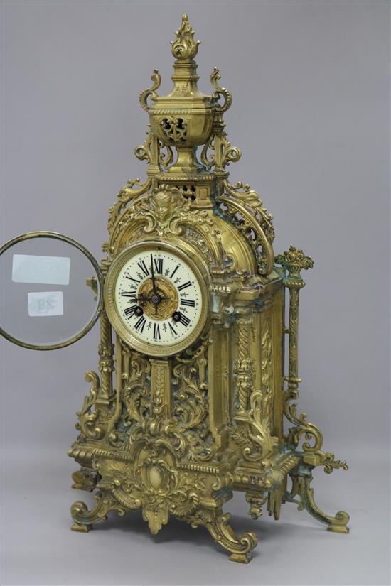 A bronze mantel clock (pendulum missing) height 49cm